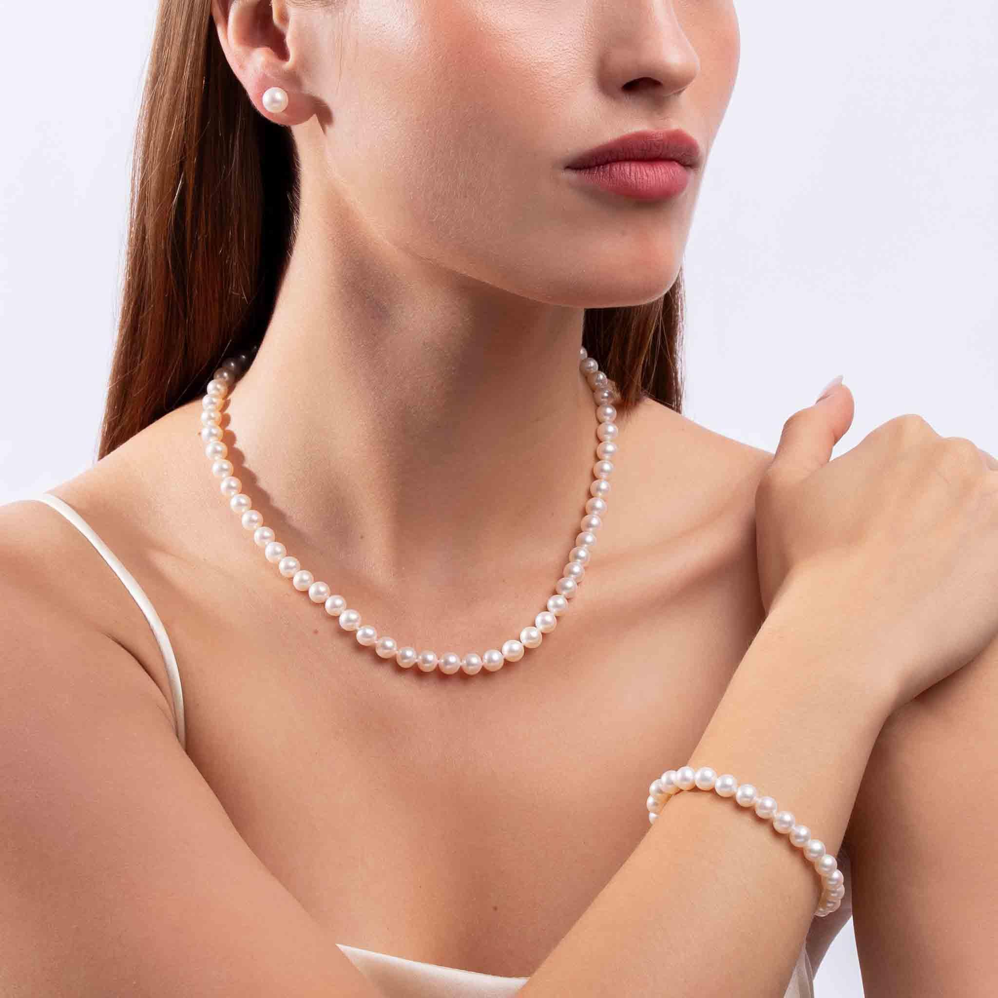 classic-white-freshwater-pearl-necklace-bracelet-earring-set-in-18k-gold