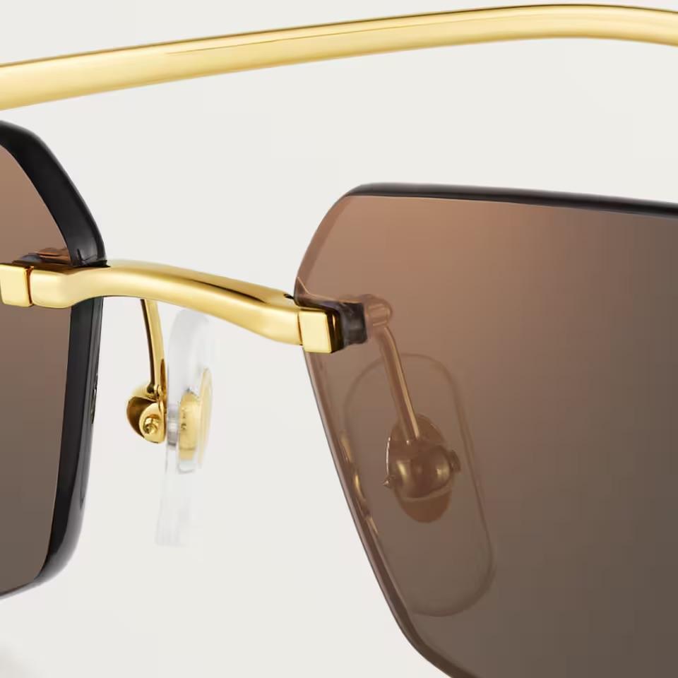 Солнцезащитные очки Cartier CRESW00686 с безободковой оправой золотистого тона и серыми линзами, 56 мм